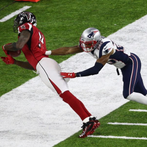 Photo of Julio Jones catching a football on the sideline